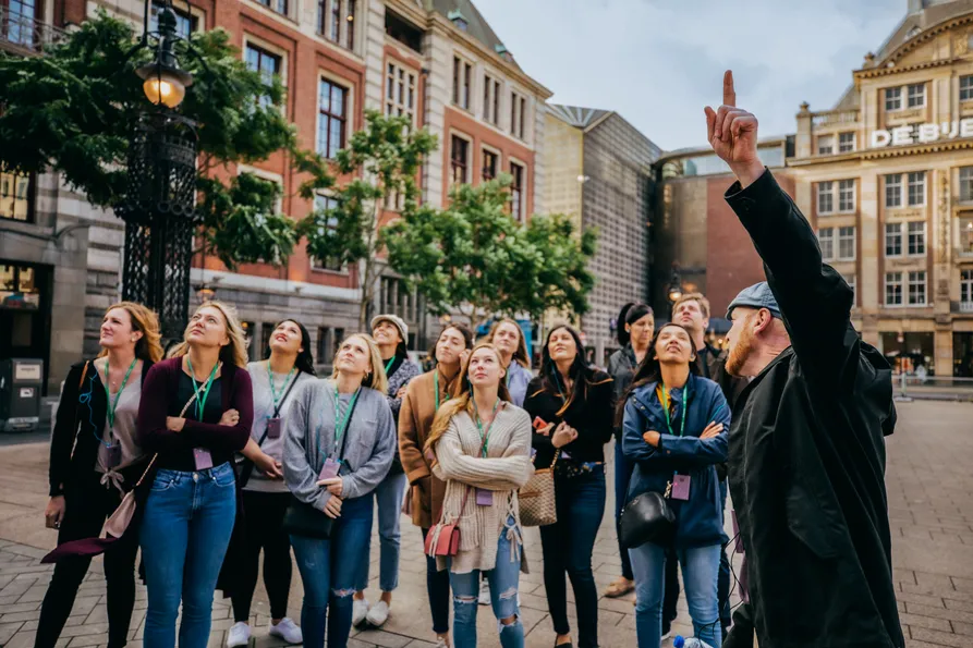 Travelers exploring a city on a guided walking tour
